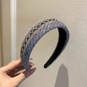 Chic tweed headband with gold chain detail in navy blue and grey woven fabric