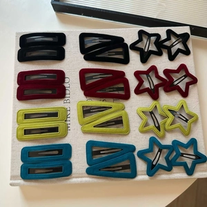 Velvet geometric hair clips in various shapes like stars and rectangles in retro colors