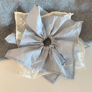 French style light blue scrunchie with lace layers and silver heart pendant detail
