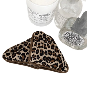 Elegant leopard print triangle bow hair claw clip for bun hairstyles on white background
