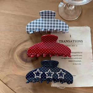 French vintage rhinestone star and polka dot hair claws set in blue and red