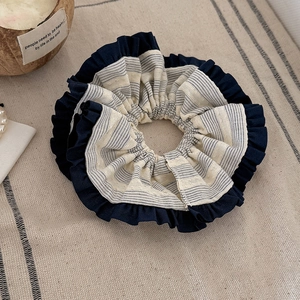 Retro beige striped scrunchie with navy blue ruffled edges for women hair styling