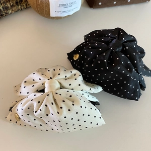 Elegant French style bow hair claws with polka dots in cream white and black finishes