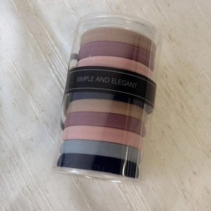 Set of durable high-elasticity braided hair ties in various Morandi colors in a barrel