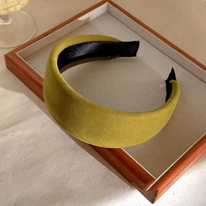 Elegant moss green velvet wide headband with premium plush texture and padded design