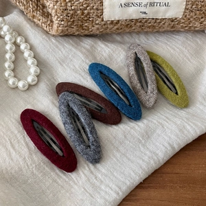 Set di sei fermagli per capelli in lana retrò in colori autunnali tra cui bordeaux e verde