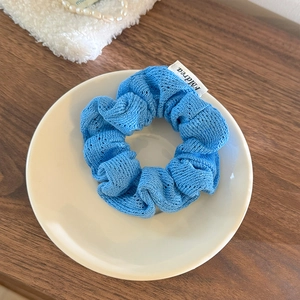 Chouchou chic en tricot ajouré bleu clair avec haute élasticité pour queue de cheval