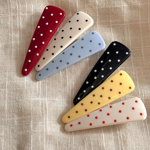 Set of 6 colorful polka dot triangular hair clips in red, beige, blue and yellow