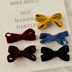 Set of five retro velvet bow hair clips in yellow, wine red, blue, brown, and black colors