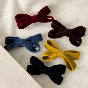 Five-piece velvet bow hair clip set in burgundy navy brown mustard and black colors