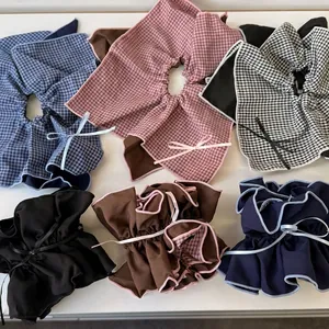 Set of 6 double-layer bow scrunchies featuring plaid patterns and solid color designs
