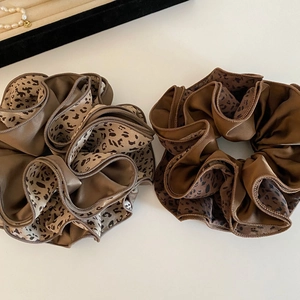 Retro brown leopard print scrunchies in premium satin fabric for elegant hair styling