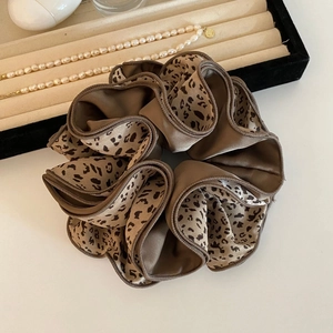 Vintage leopard print oversized scrunchie hair tie with elegant brown silk texture