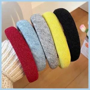 Set of five thick knitted headbands in red blue grey yellow and black colors