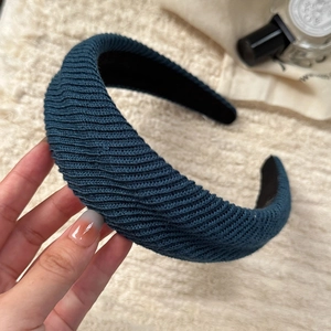 Navy blue knitted headband with vertical ribbed texture for women autumn winter style