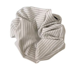 Elegant black and white pinstripe fabric scrunchie with thick pleats and high elasticity