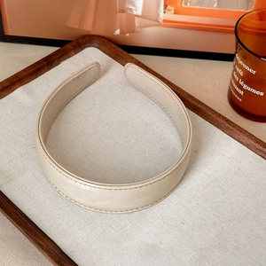 Retro cream PU leather headband with wide frame and visible stitching for women