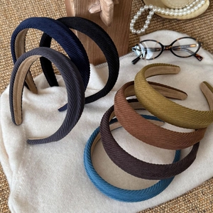Minimalist twill fabric headbands in vintage colors with ribbed texture and velvet lining