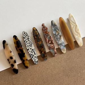 Set of 8 vintage acetate hair clips in tortoiseshell and marble patterns for women