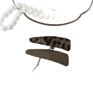 Set of leopard print and olive velvet triangular hair clips for stylish hair styling