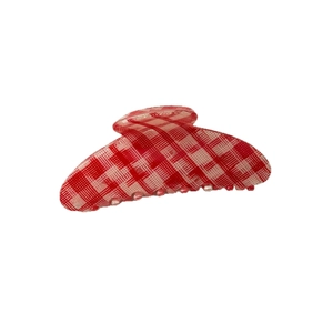 Minimalist red checkered pattern hair claw clip with acetate texture on white background