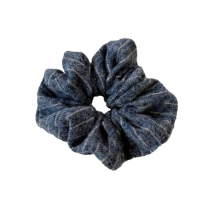 Minimalist striped knit scrunchie in navy blue and grey with textured fabric for ponytails