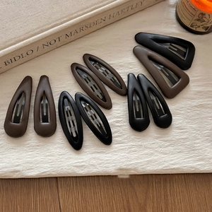 Vintage matte leather geometric hair clips set in brown and black for women styling