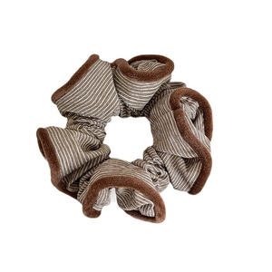 Vintage oversized striped hair scrunchie with brown plush trim for elegant hairstyles