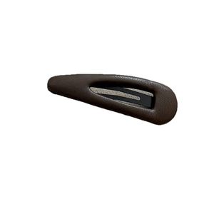 Vintage dark brown leather triangle snap hair clip with minimalist textured finish