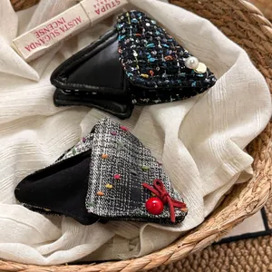 Elegant tweed triangle hair claw clip with pearls and ribbon bow in vintage style