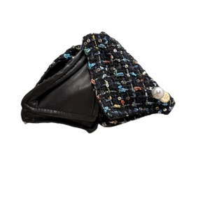 Elegant tweed hair claw clip with black sequins, a faux pearl, and a gold love charm
