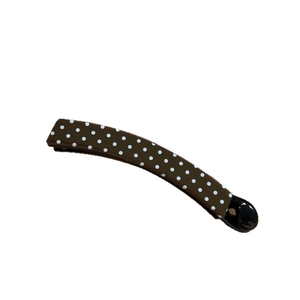 Brown polka dot banana hair clip for high ponytail styling on a white background
