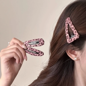 Vintage pink leopard print hair clips featuring triangle and oval shapes for women