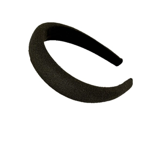 Minimalist black padded sponge headband with velvet texture and high top volume design