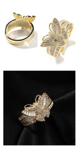 Detail of butterfly ring with shimmering cubic zirconia and adjustable gold-plated band