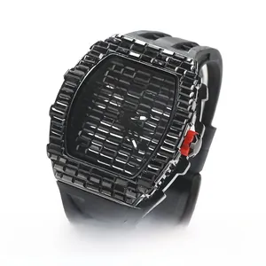 Detail of iced-out hip hop watch with black rhinestones and unique red side button