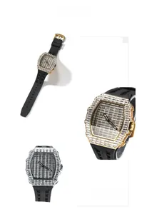 Macro shot of gold and silver luxury watch bezels with iced-out crystals and silicone strap