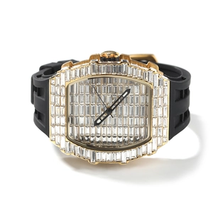 Close-up of hip-hop watch featuring luxury baguette diamonds and black silicone strap