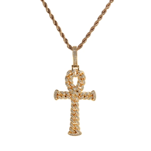 Close-up of gold Ankh cross pendant with micro-paved cubic zirconia and rope chain