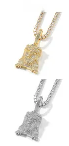Detail of two-tone hip hop Jesus pendant with cubic zirconia on a tennis chain