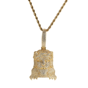 Detailed close-up of gold hip hop Jesus pendant with white zircon micro-paving on rope chain