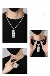 Hip hop tennis chain with iced out 100 dollar bill pendant shown on a model