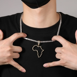Close-up of iced out Africa map pendant with zircon tennis chain for hip-hop style