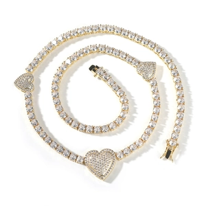 Elegante gouden hart tennis ketting met ronde witte zirkonia stenen in spiraalvorm