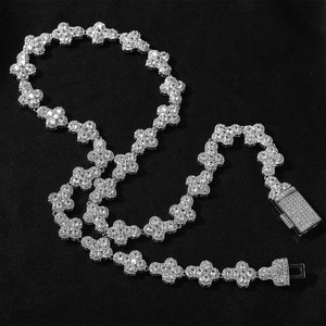Macro view of silver luxury hip hop necklace with micro-paved zircons in flower pattern