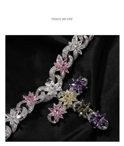 Macro shot of colorful marquise zircon flower petals on a sparkling Cuban chain link