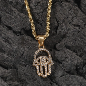 Classic gold Hamsa hand pendant necklace with white rhinestones and twisted rope chain