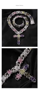 Detail view of iced out Cuban chain with colorful flower accents and zircon cross pendant