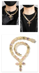 Macro detail of high-quality colorful zircon stones set in a golden hip hop cross necklace
