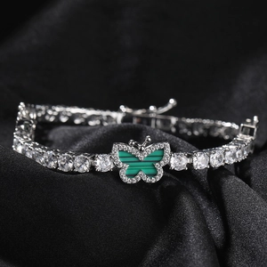 Chic silver tennis necklace featuring a green butterfly pendant and sparkling zircons